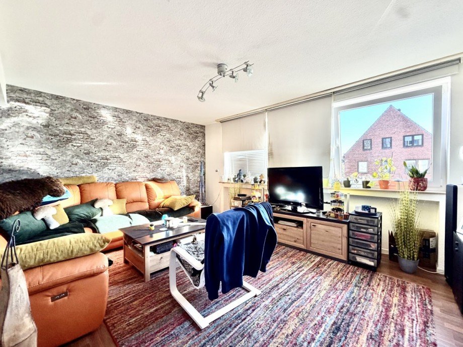 Wohnzimmer 1. OG R Mehrfamilienhaus Oberhausen